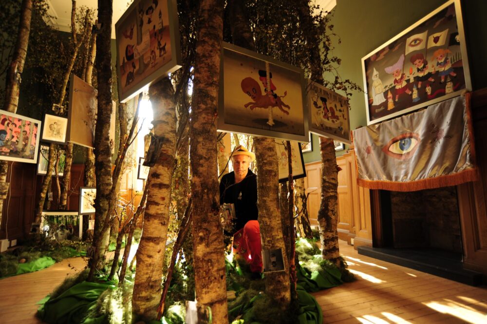Multi- disciplinary artist Gary Baseman from Los Angeles inside his art installation 'Mythical Homeland' running at Summerhall.