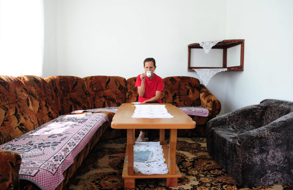 Bosnia, 15 years after the war. With few personal belonings Nermina Smajlovic sits alone in a strikingly empty house. A mother of threee her husband never returned after the fall of Srebrenica. The only photograph she has of him is a blurred print of documentary screen grab someone gave to her.