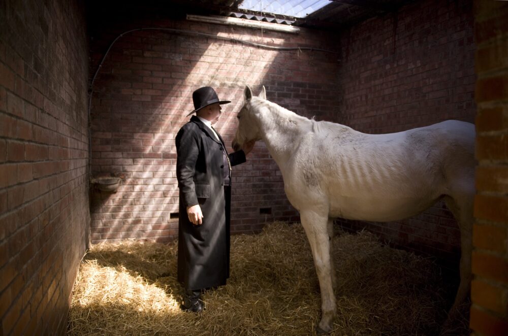 Pipe Major Iain Grant of the 79th New York Highlanders, Edinburgh who dresses as Wyatt Earp every day. Grant is pictured at Tower Farm Riding School exclusively for The Herald.