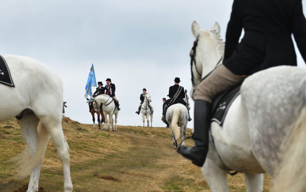 Members of the Edinburgh March Riding Association (EMRA) attend a photocall to unveil a new replica of the Blue Blanket Flag to mark the start of the commemoration of the Battle of Flodden 500 years ago. The historic Blue Blanket flag was originally created by Queen Margaret and her Ladies in Waiting. This year 300 riders are expected to take part in one of the largest Rides in Scotland culminating in a procession up Edinburgh's Royal Mile on Sunday 8th September. The Ride commemorates the tradition of inspecting the city's boundaries but the 2013 rides marks the disasterous battle of 9th September in which King James IV was among the dead.
